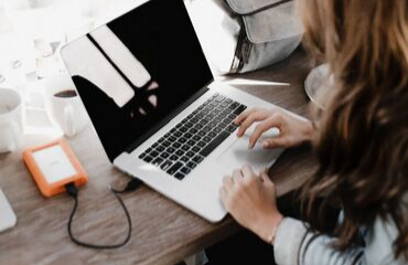 Laptop user sat at desk