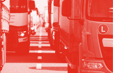 Lorries lined up along a road