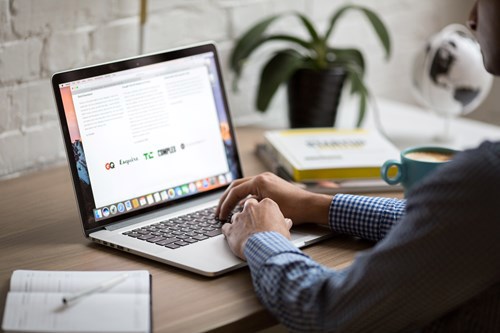 Laptop user sat at desk