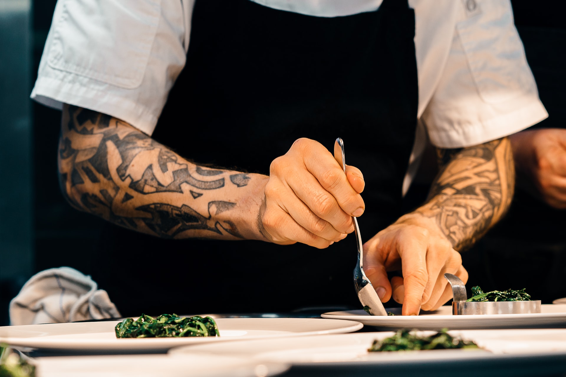 Chef Plating Up Food