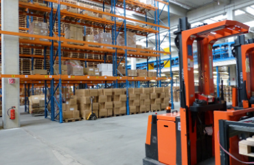 Logistics warehouse with crates and shelves
